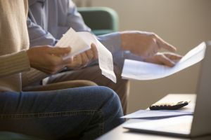 Spouses review estate plan documents