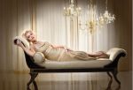 Anna Nicole portrait of her lying on a couch concept